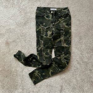 Distressed camo jeans